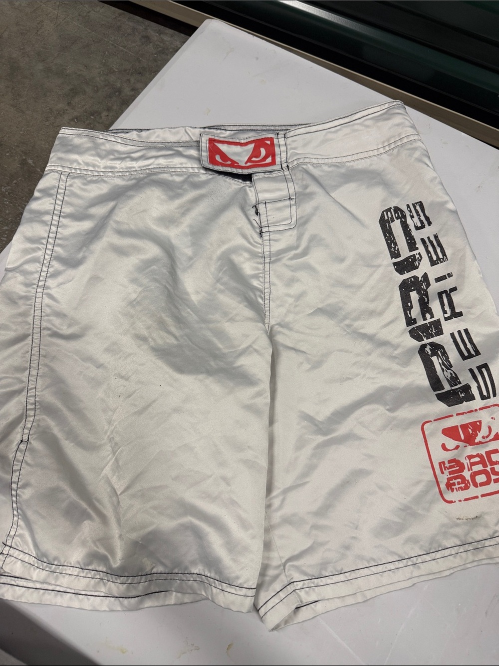 Men’s White Board Shorts with Red Logo Accents